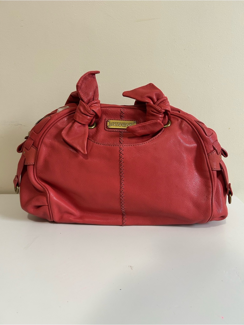 Lockheart coral Leather Bow-Handle hand bag